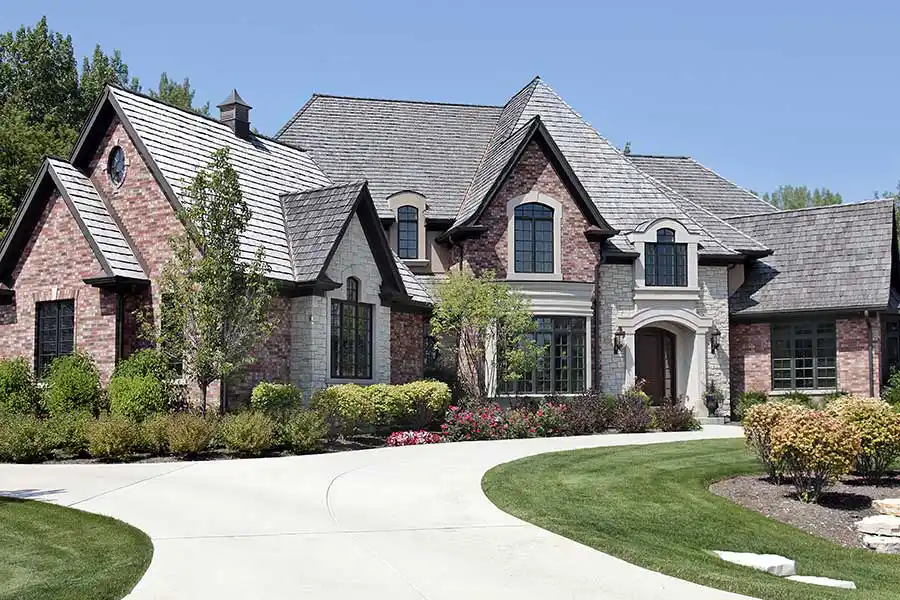 Suburban luxury home in a residential neighborhood - Keep pests away from your home with Anderson Pest Solutions in IL and IN