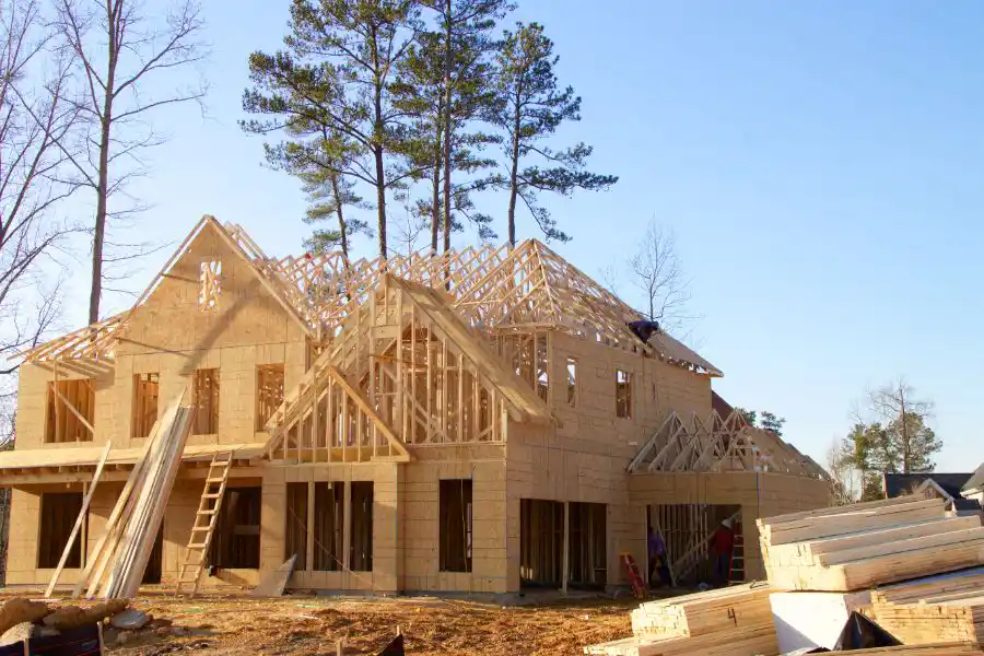 A home under construction with exposed wood - Keep pests away from your home with Anderson Pest Solutions in IL and IN